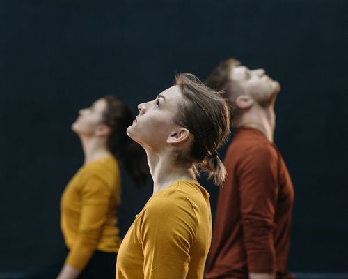 Group of people practicing mindfulness and light movements